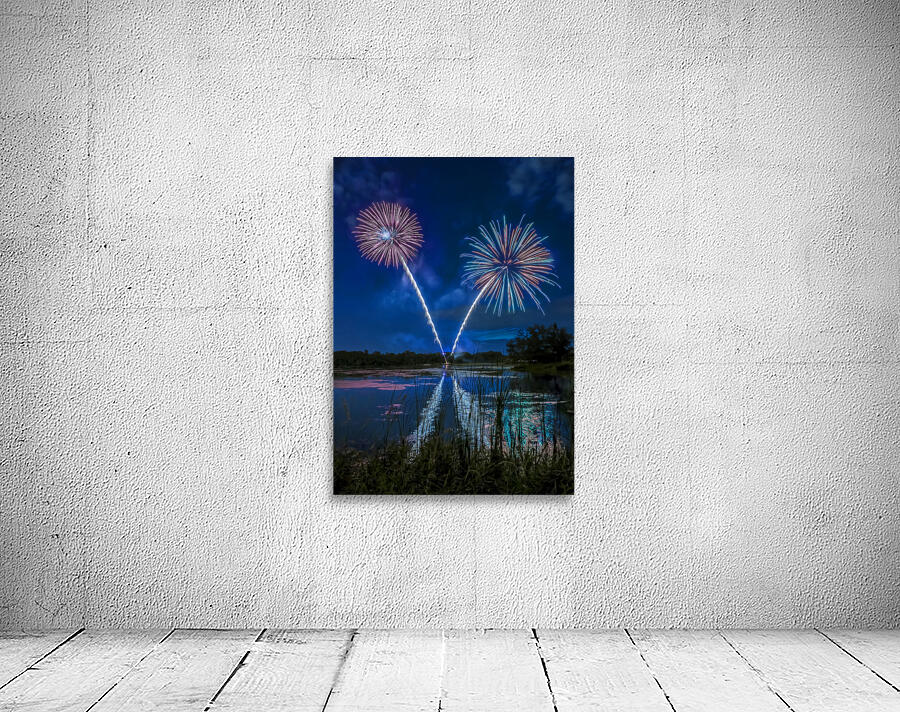 Reflections of fireworks by Jim Radford